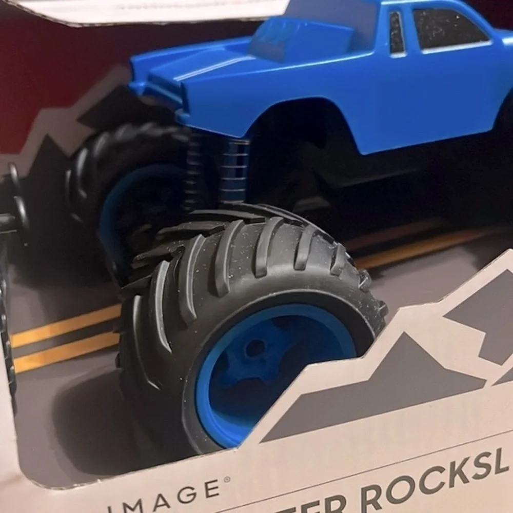 Brand New Sharper Image Remote Control Mini Monster Truck Rockslide Blue Toy